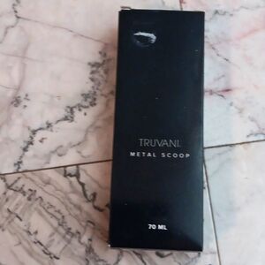 NEB Truvani gold metal scoop